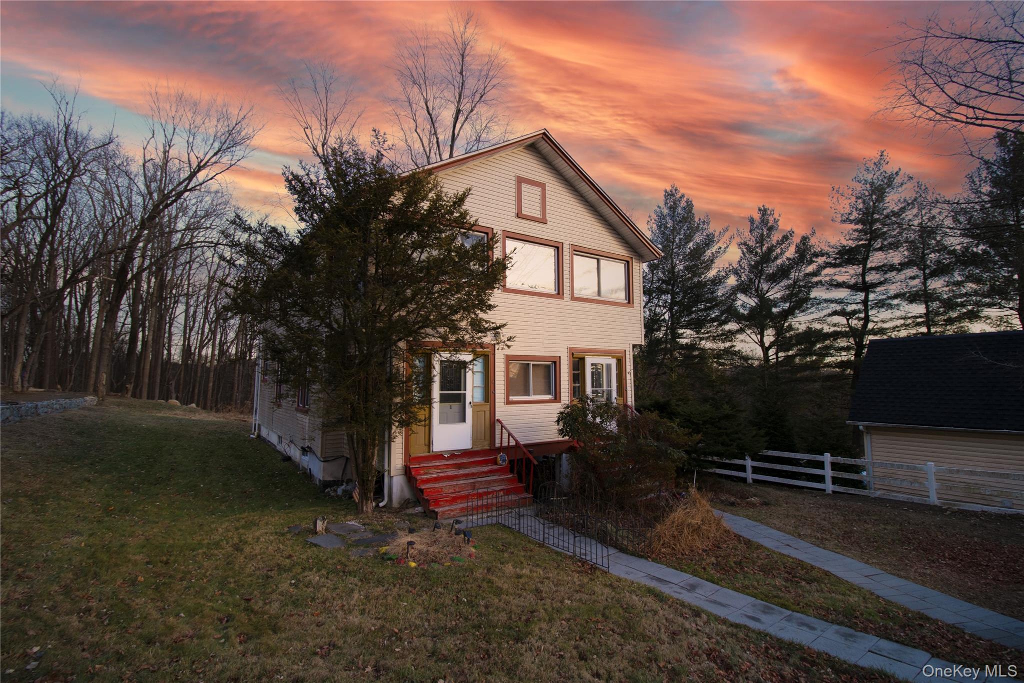 View of front of house featuring entry steps