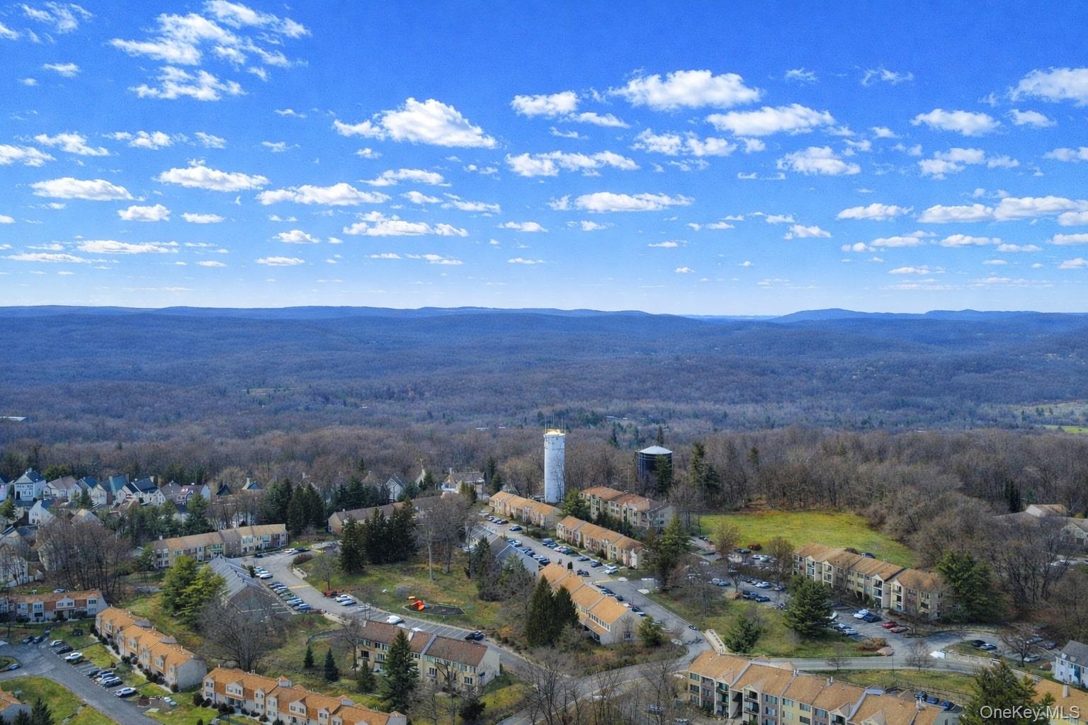 6 Stowe Road Peekskill, NY 10566 - Photo 13 of 17 Aerial view of property's location with a heavily wooded area and mountains