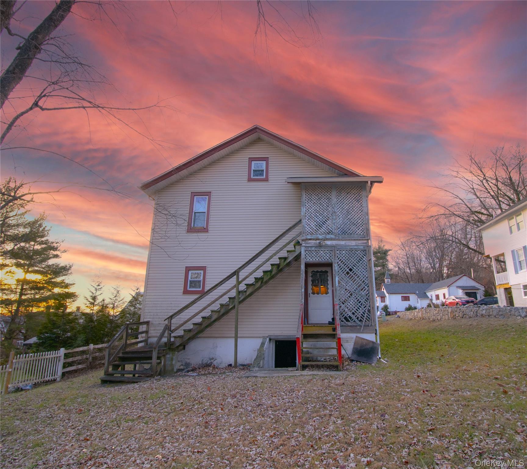 6 Stowe Road Peekskill, NY 10566 - Photo 4 of 17 Rear view of property with stairway