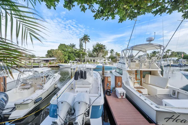 a view of a balcony with two chairs and a table