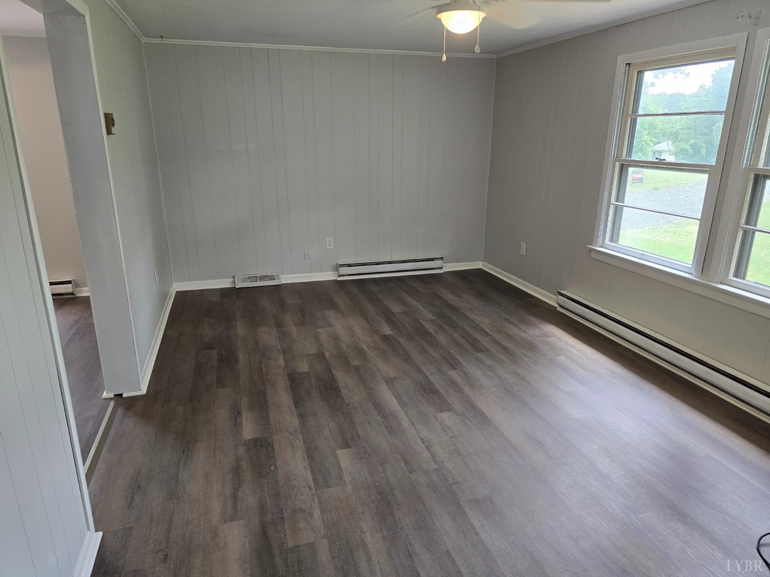 2500 Sunnymeade Road Rustburg, VA 24588 - Photo 3 of 3 wooden floor in an empty room with a window