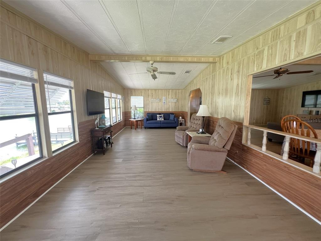 2055 South Floral Avenue, Unit 133 Bartow, FL 33830 - Photo 21 of 62 a living room with furniture and a large window