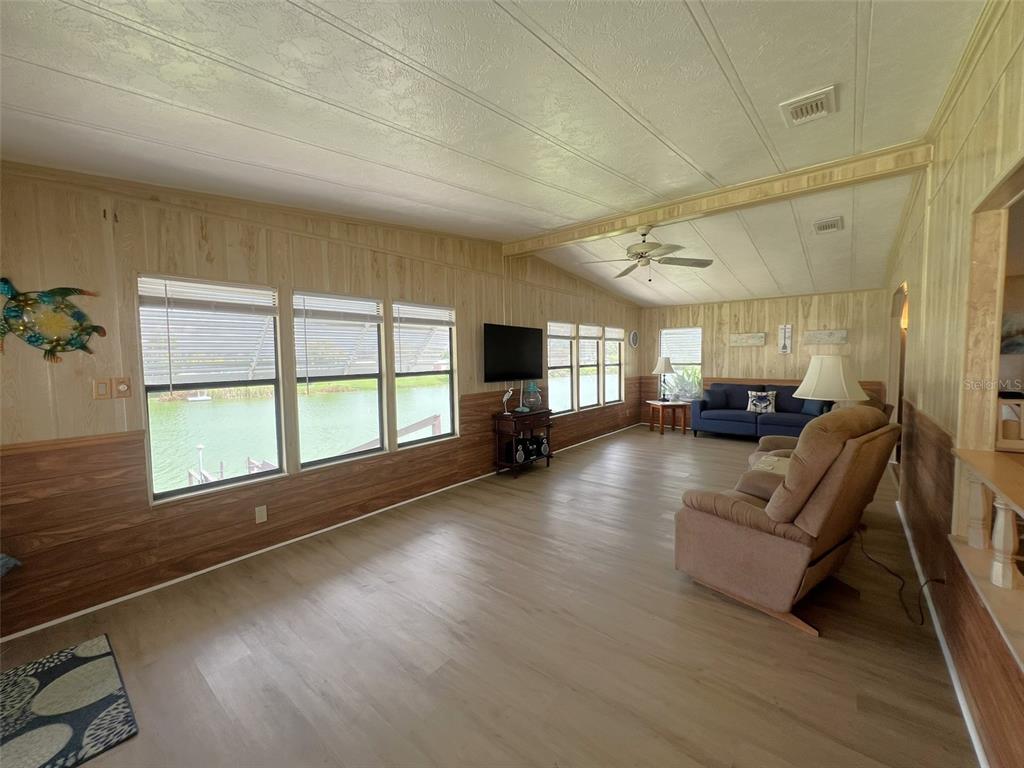 2055 South Floral Avenue, Unit 133 Bartow, FL 33830 - Photo 22 of 62 a living room with furniture and a large window