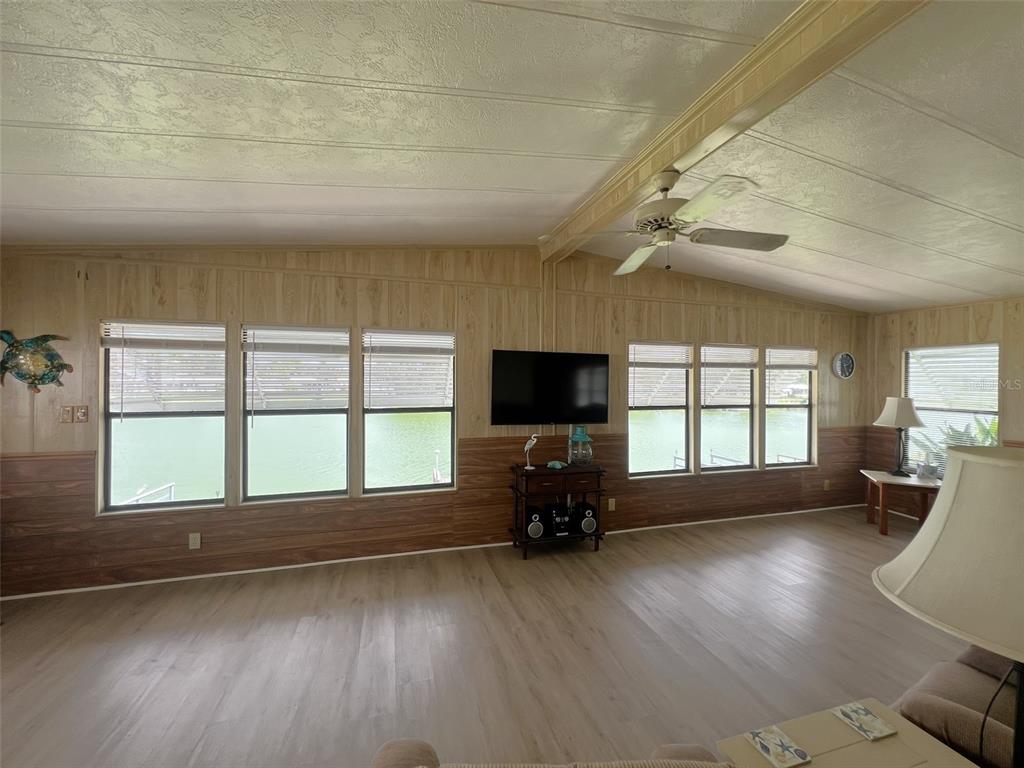 2055 South Floral Avenue, Unit 133 Bartow, FL 33830 - Photo 23 of 62 a living room with furniture and a large window