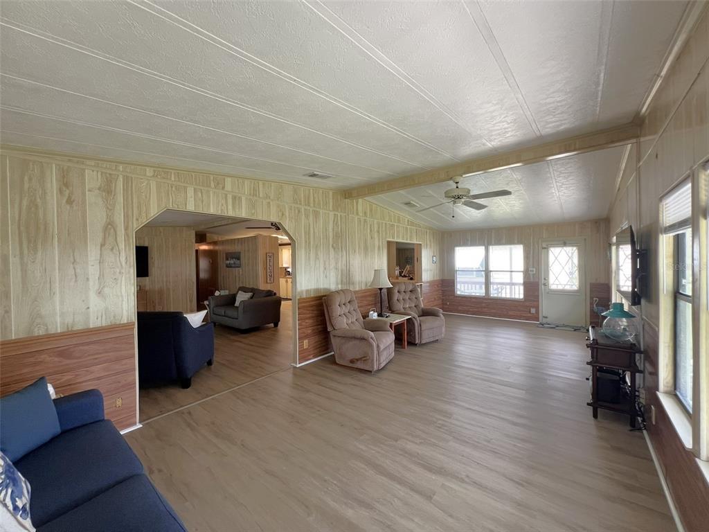 2055 South Floral Avenue, Unit 133 Bartow, FL 33830 - Photo 26 of 62 a living room with furniture and a wooden floor