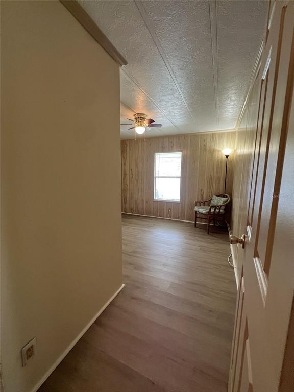 2055 South Floral Avenue, Unit 133 Bartow, FL 33830 - Photo 34 of 62 a view of a room with wooden floor and windows