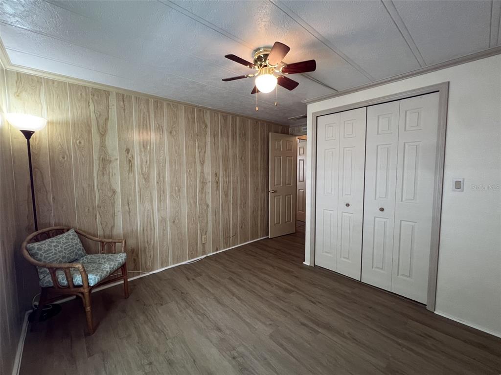 2055 South Floral Avenue, Unit 133 Bartow, FL 33830 - Photo 37 of 62 a view of workspace with wooden floor and ceiling fan