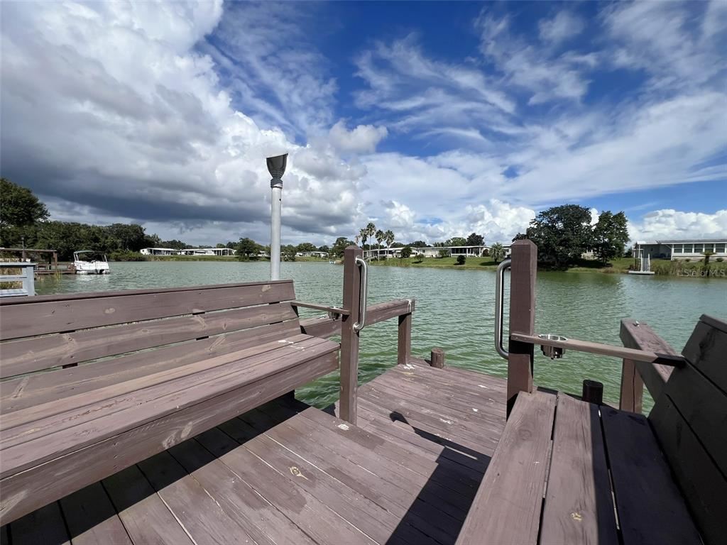 2055 South Floral Avenue, Unit 133 Bartow, FL 33830 - Photo 52 of 62 a view of a lake with sitting area