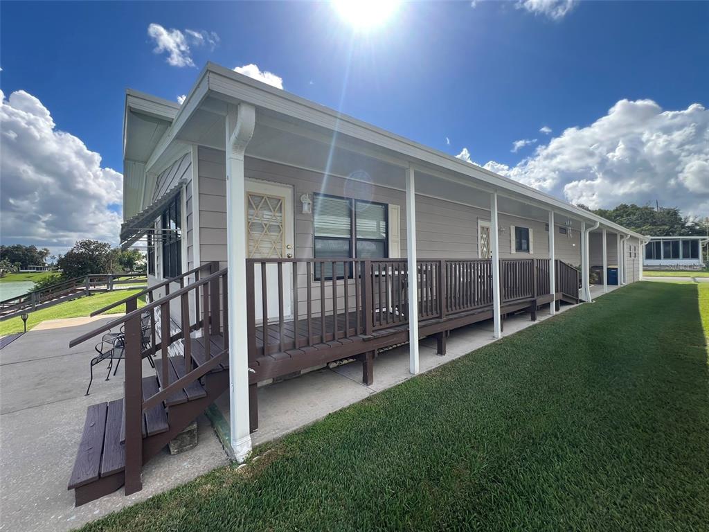2055 South Floral Avenue, Unit 133 Bartow, FL 33830 - Photo 60 of 62 a view of backyard with deck and barbeque oven