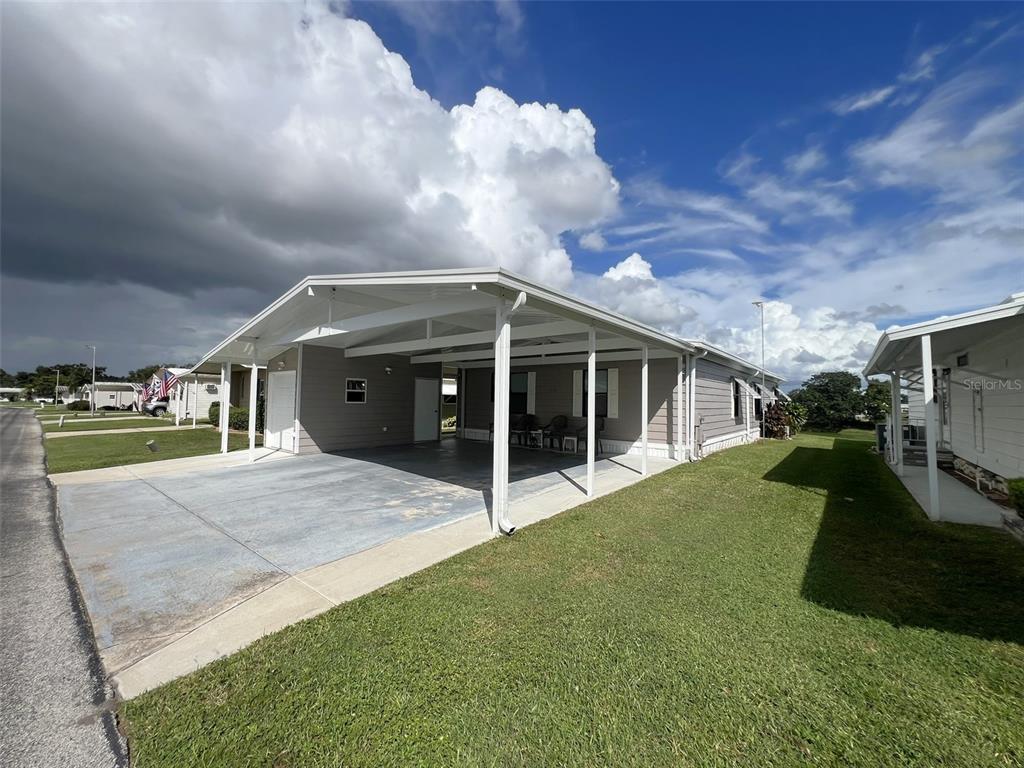 2055 South Floral Avenue, Unit 133 Bartow, FL 33830 - Photo 62 of 62 a view of house and outdoor space