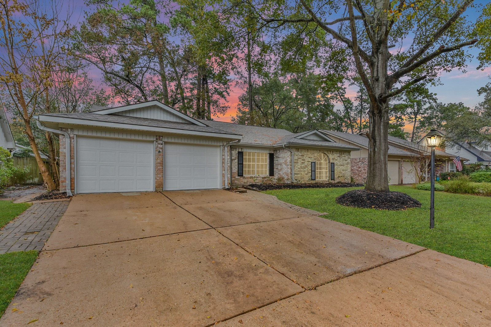 9718 John Bank Drive Spring, TX 77379 - Photo 2 of 39 front view of a house with a yard