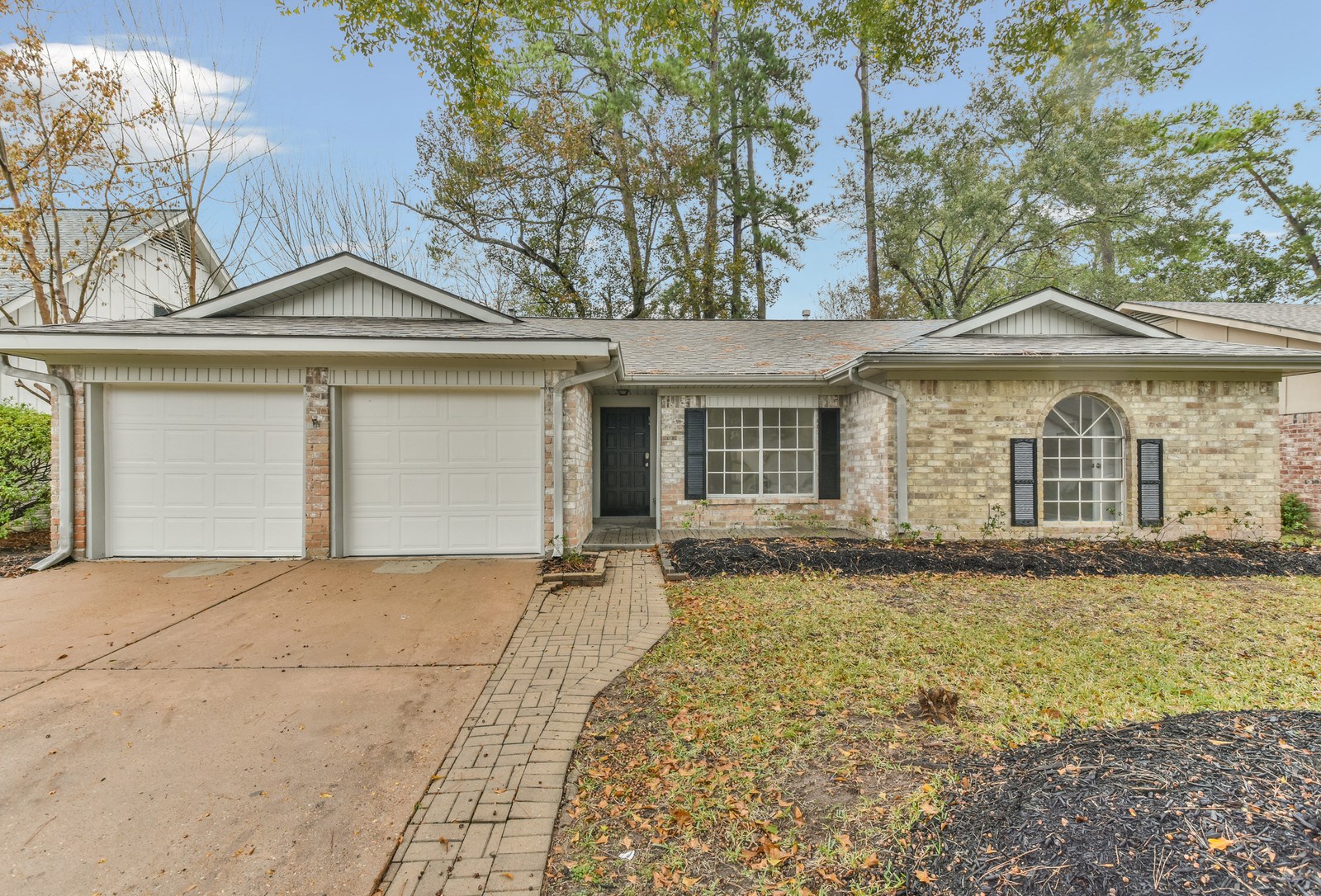 9718 John Bank Drive Spring, TX 77379 - Photo 34 of 39 front view of a house with a yard