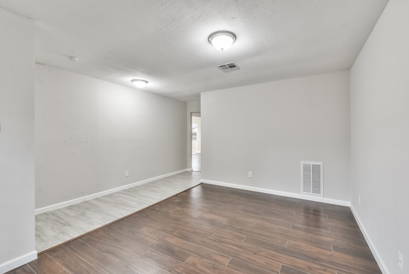 9718 John Bank Drive Spring, TX 77379 - Photo 6 of 39 wooden floor in an empty room