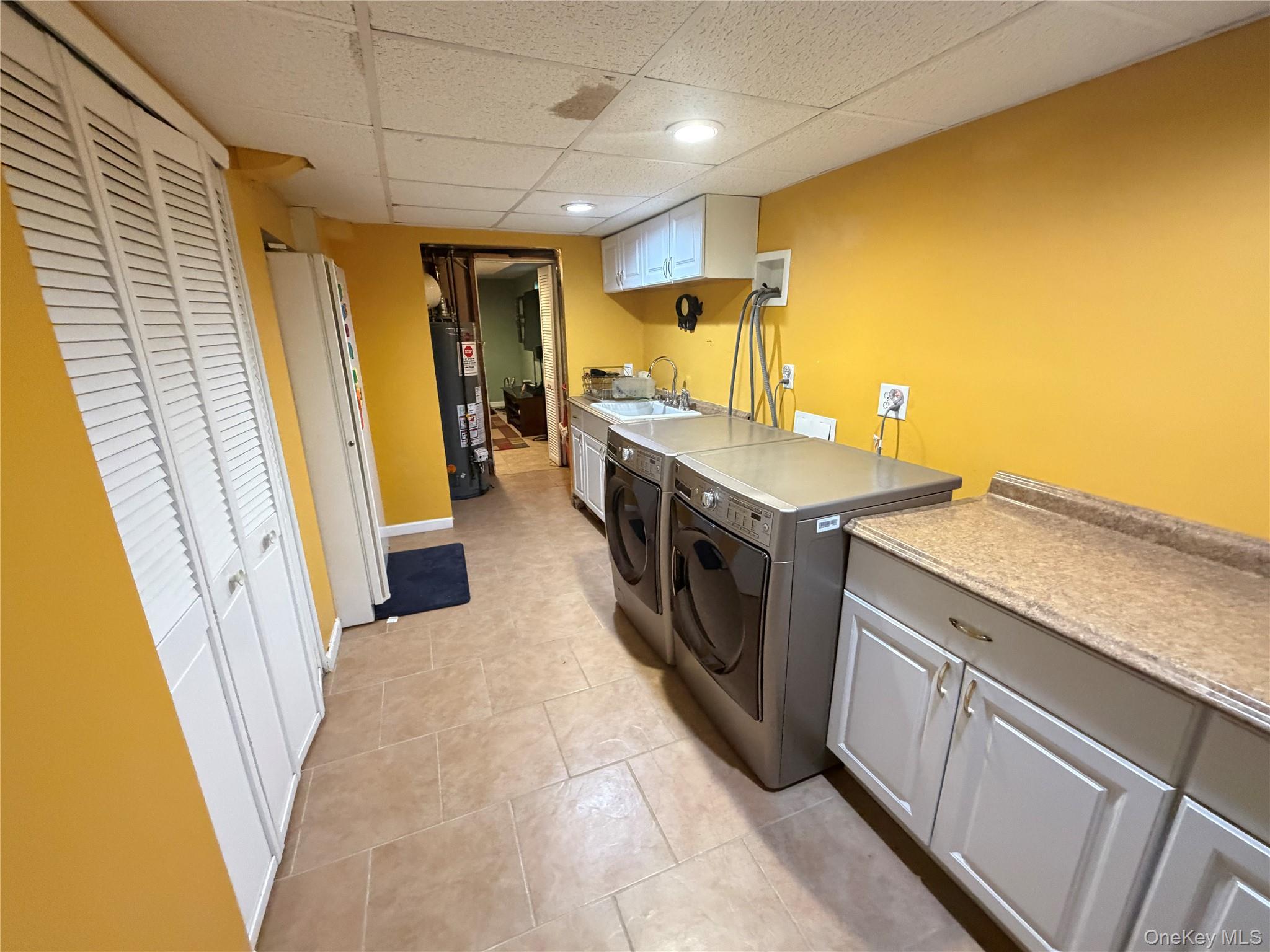 17 Mallory Road Spring Valley, NY 10977 - Photo 20 of 26 a utility room with dryer and washer