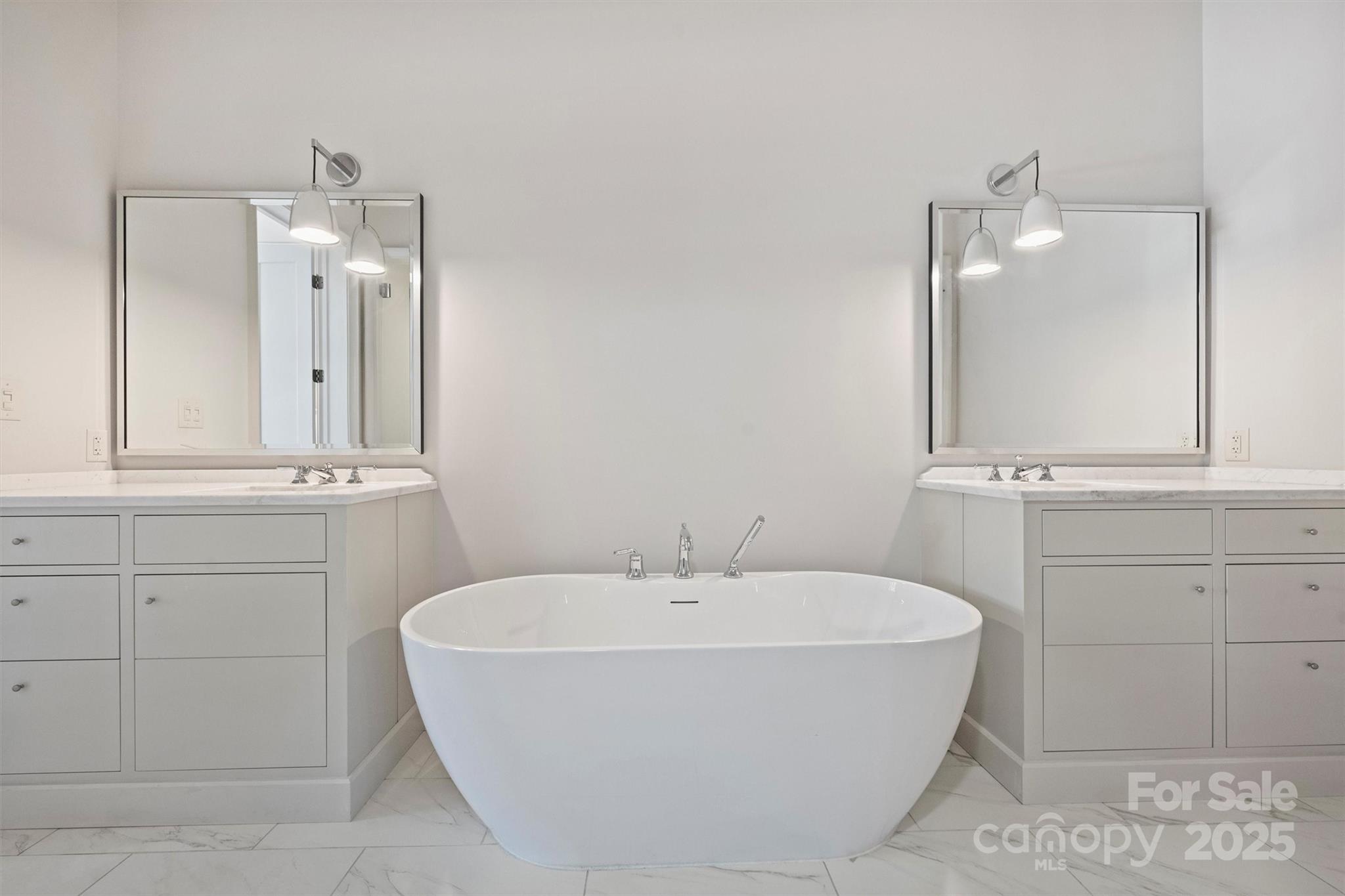 1170 Queens Road Charlotte, NC 28207 - Photo 16 of 29 a bathroom with a sink and a mirror