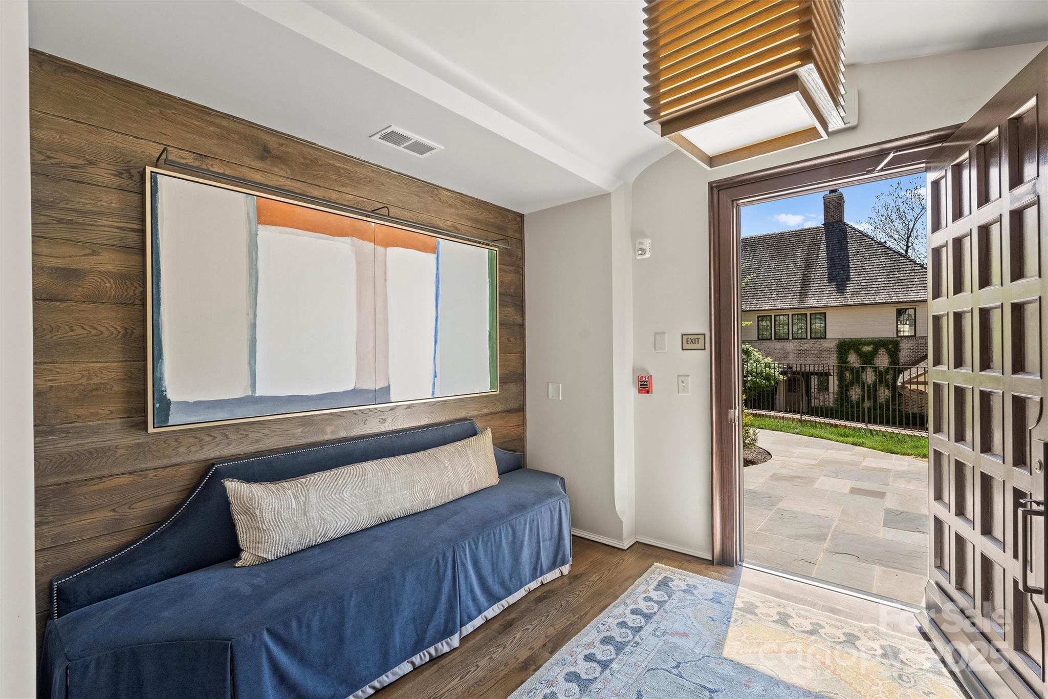 1170 Queens Road Charlotte, NC 28207 - Photo 24 of 29 a bedroom with furniture and a window