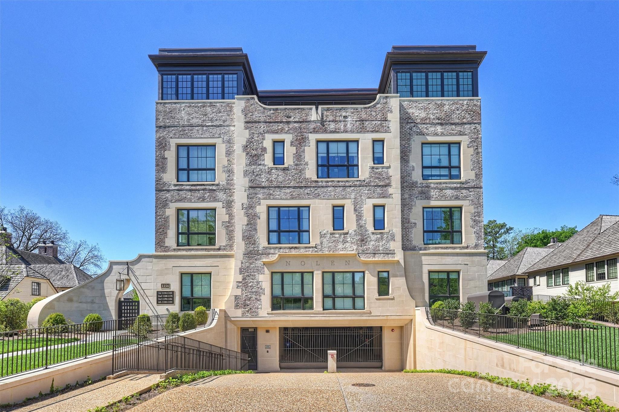 1170 Queens Road Charlotte, NC 28207 - Photo 27 of 29 a front view of a building with balcony