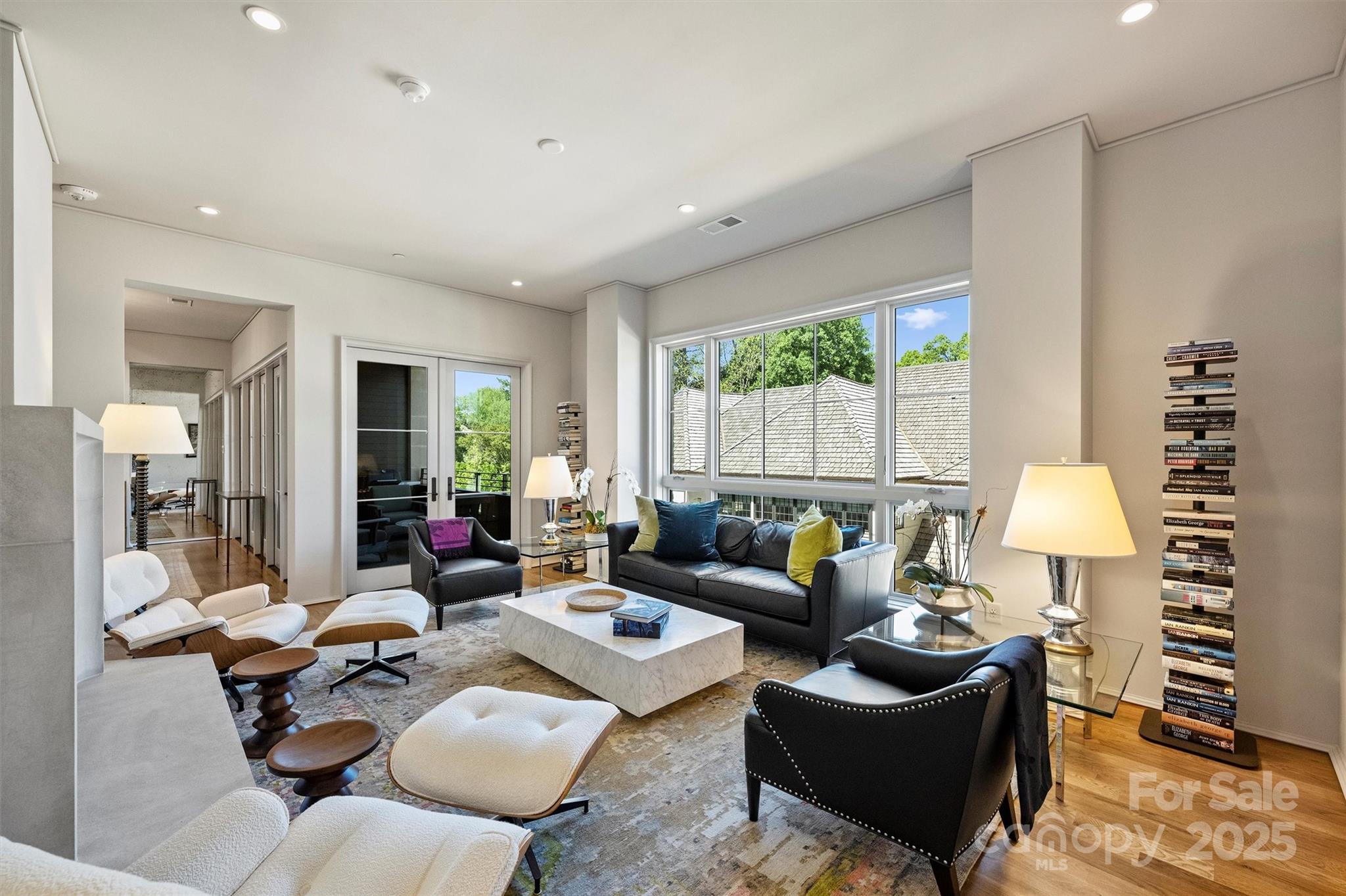 1170 Queens Road Charlotte, NC 28207 - Photo 3 of 29 a living room with furniture fireplace and a large window
