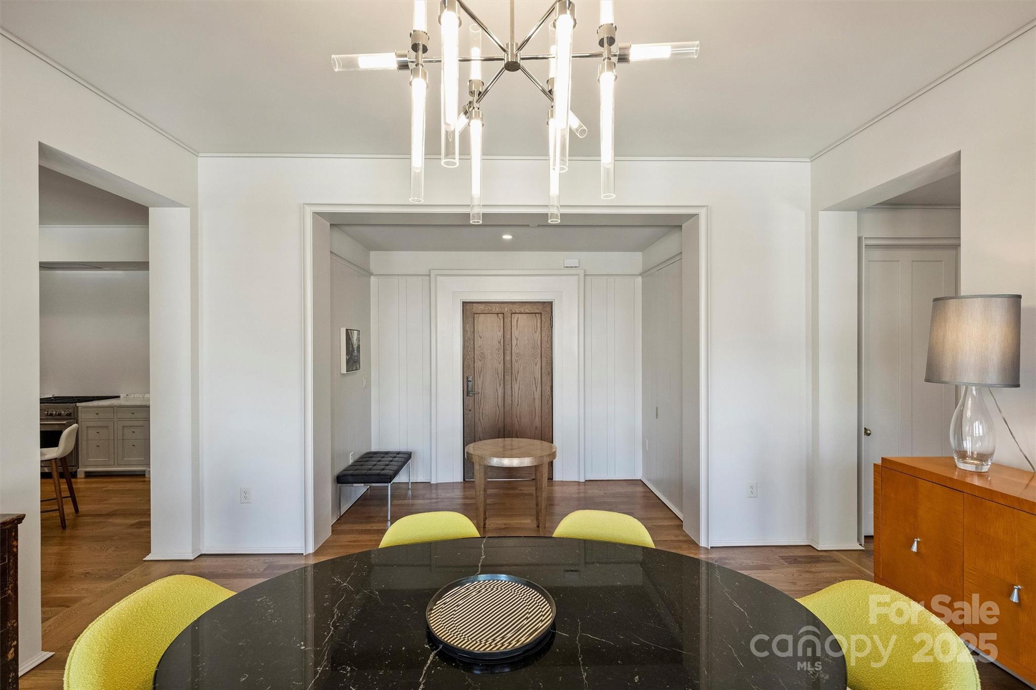 1170 Queens Road Charlotte, NC 28207 - Photo 8 of 29 a living room with furniture and wooden floor
