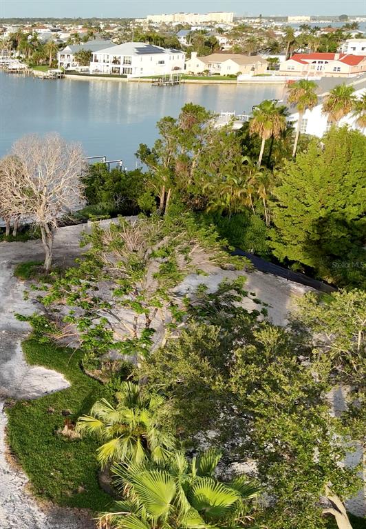175 Bath Club Boulevard North North Redington Beach, FL 33708 - Photo 4 of 10 a view of a lake with a city