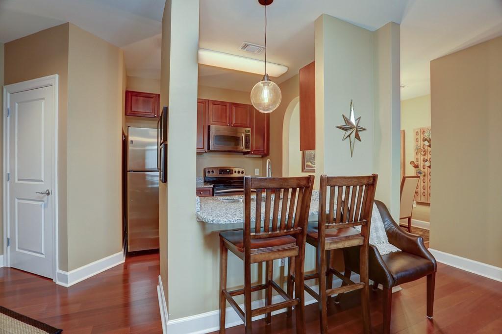 325 East Paces Ferry Road Northeast, Unit 1510 Atlanta, GA 30305 - Photo 2 of 33 a view of a dining room with furniture