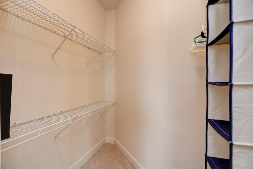 325 East Paces Ferry Road Northeast, Unit 1510 Atlanta, GA 30305 - Photo 24 of 33 a view of an empty walk in closet