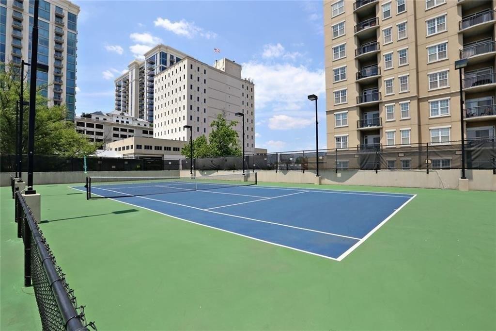 325 East Paces Ferry Road Northeast, Unit 1510 Atlanta, GA 30305 - Photo 27 of 33 a view of a tennis court