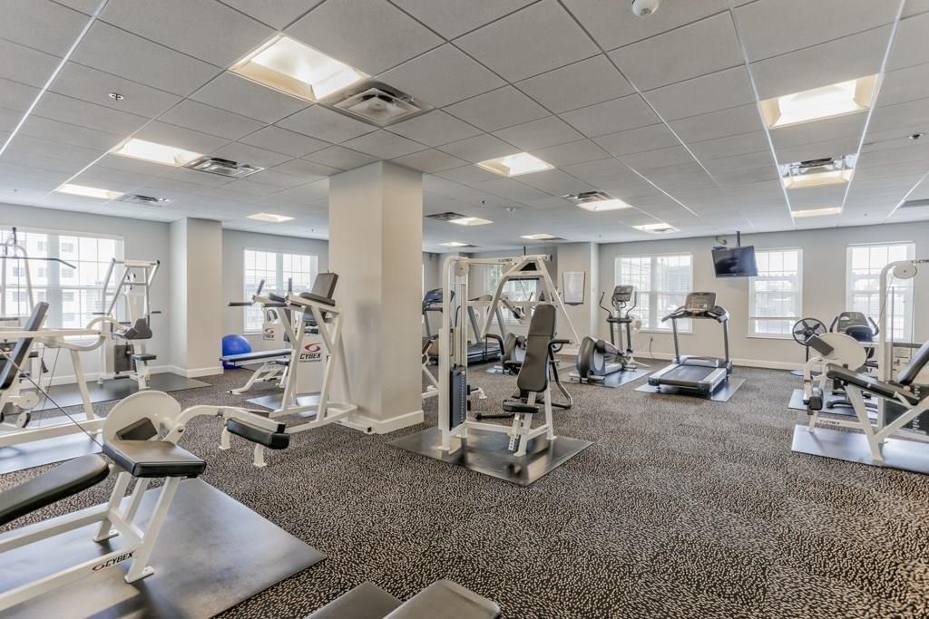 325 East Paces Ferry Road Northeast, Unit 1510 Atlanta, GA 30305 - Photo 29 of 33 a view of a room with gym equipment