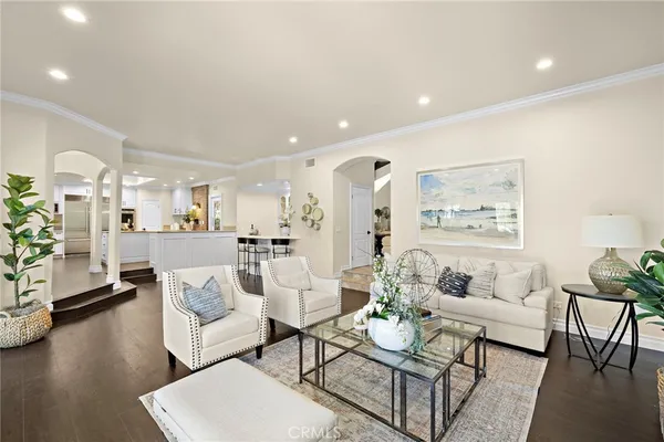 a living room with furniture and a table