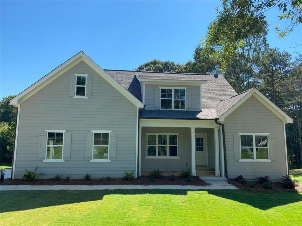 536 Elder Road Winder, GA 30680 - Photo 1 of 1 a front view of a house with a yard