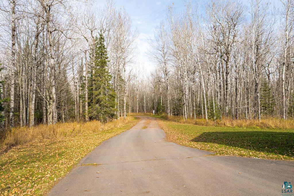 6048 Lakewood Road Duluth, MN 55804 - Photo 21 of 65 View of asphalt road featuring a view of trees