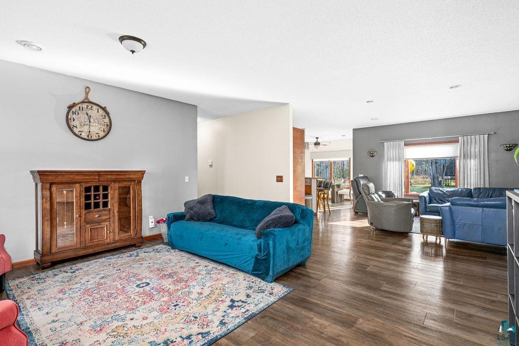 6048 Lakewood Road Duluth, MN 55804 - Photo 23 of 65 Living area with dark wood-type flooring and ceiling fan