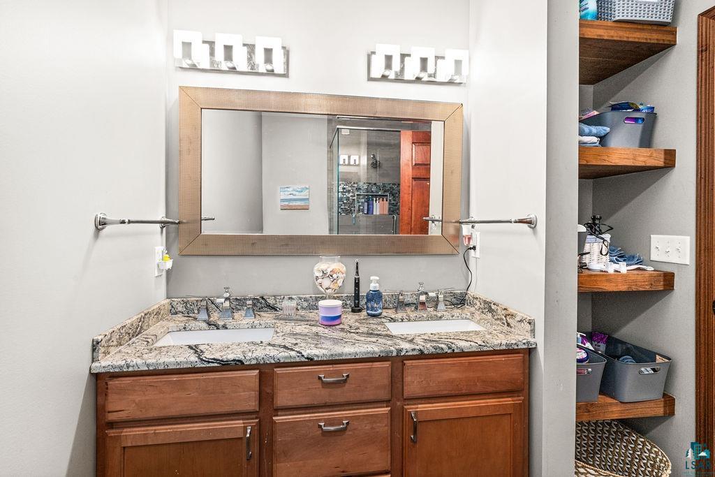 6048 Lakewood Road Duluth, MN 55804 - Photo 49 of 65 Full bath with double vanity and a shower
