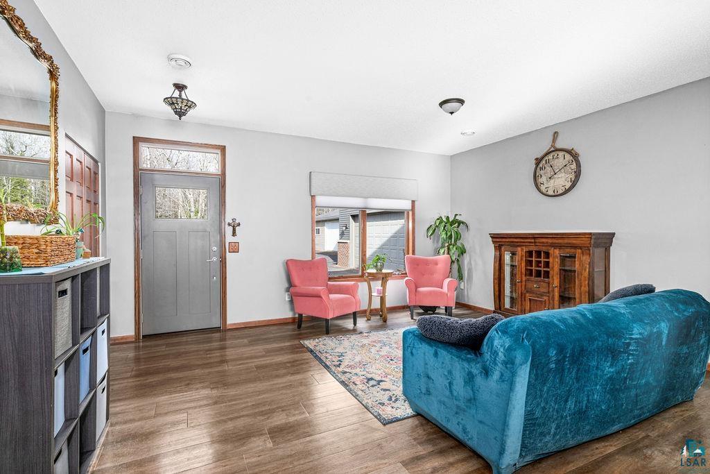 6048 Lakewood Road Duluth, MN 55804 - Photo 54 of 65 Living room with wood finished floors and baseboards