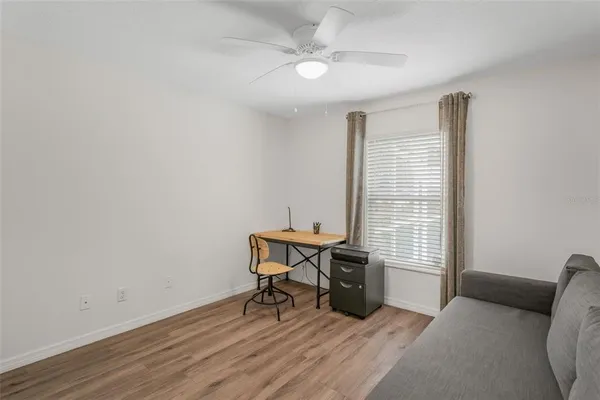 a view of room with hardwood floor