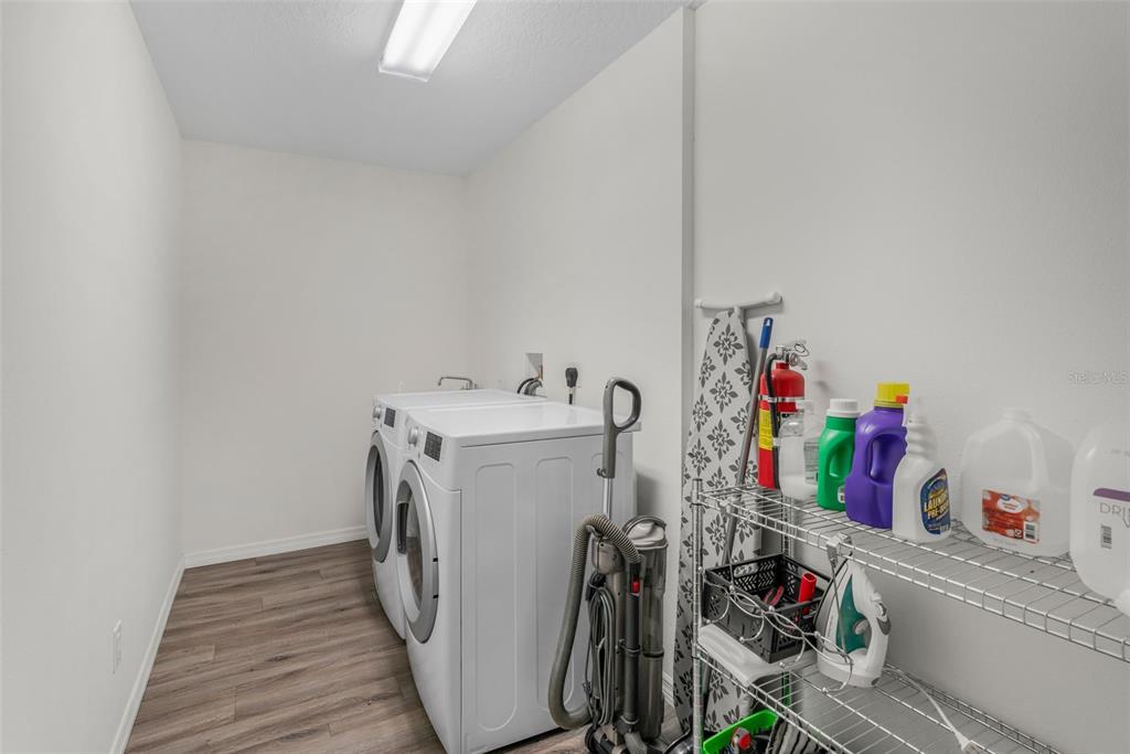 276 North Cunningham Avenue Inverness, FL 34453 - Photo 45 of 48 a utility room with dryer and washer