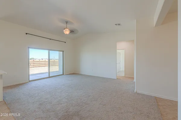 a kitchen with stainless steel appliances a stove microwave and refrigerator