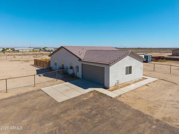 a view of a backyard of a house