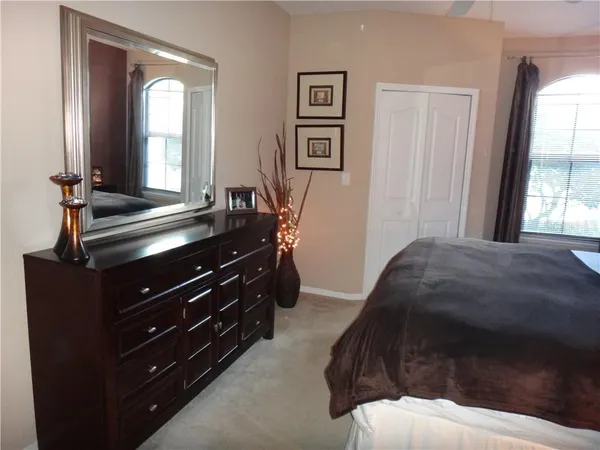 a bathroom with a sink vanity and a mirror