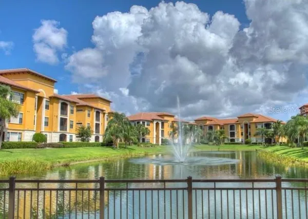 a view of swimming pool with outdoor seating
