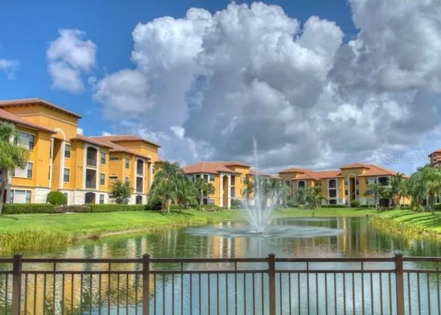 a view of swimming pool with outdoor seating
