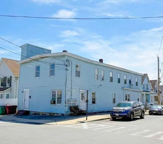 a car parked in front of a building