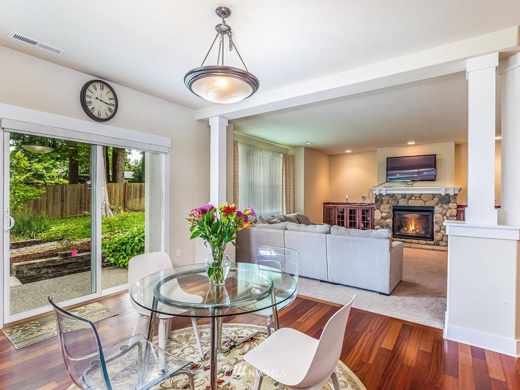 5111 Northeast 25th Street Renton, WA 98059 - Photo 12 of 29 a kitchen with a table and chairs in it