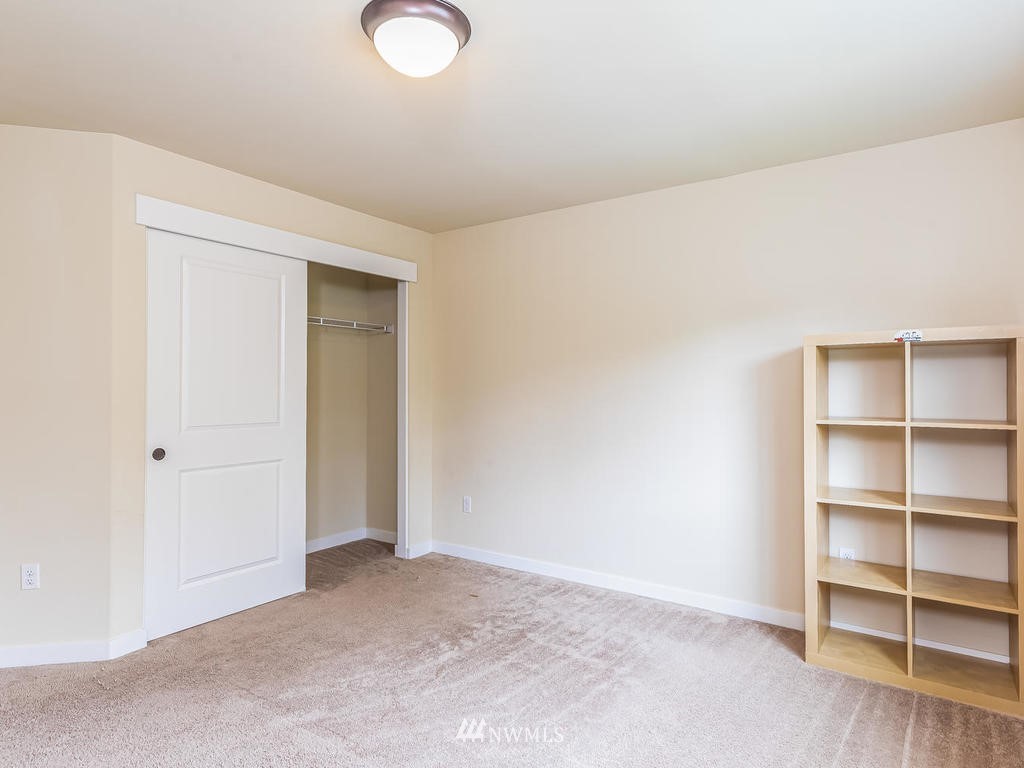 5111 Northeast 25th Street Renton, WA 98059 - Photo 20 of 29 a view of a room with closet and racks