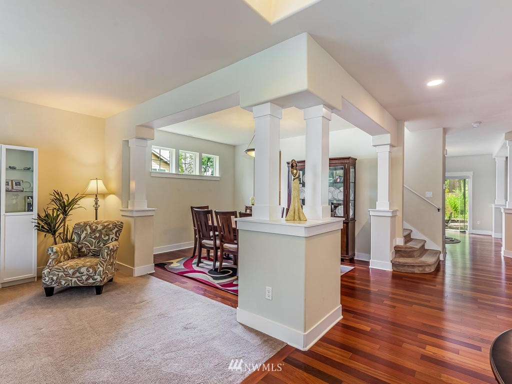 5111 Northeast 25th Street Renton, WA 98059 - Photo 3 of 29 a view of livingroom with furniture and wooden floor