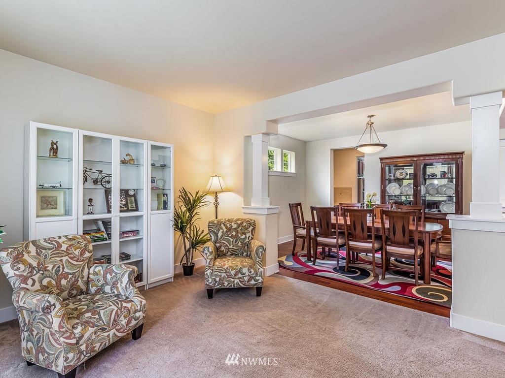 5111 Northeast 25th Street Renton, WA 98059 - Photo 4 of 29 a living room with furniture and a window