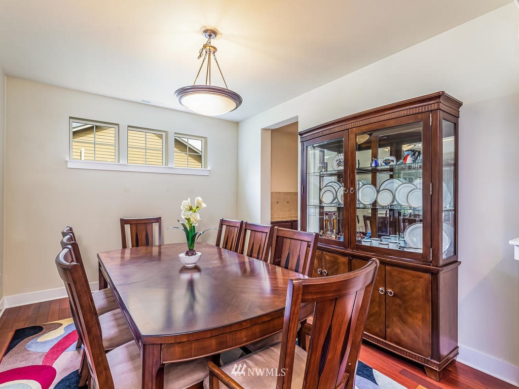 5111 Northeast 25th Street Renton, WA 98059 - Photo 5 of 29 a view of a dining room with furniture window and outside view