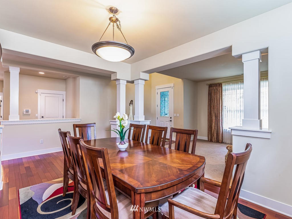 5111 Northeast 25th Street Renton, WA 98059 - Photo 6 of 29 a view of a dining room with furniture