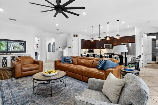 a kitchen with a sink stove and microwave