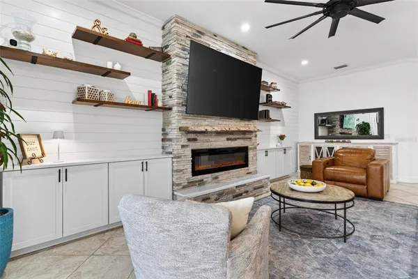 a kitchen with granite countertop wooden cabinets and stainless steel appliances